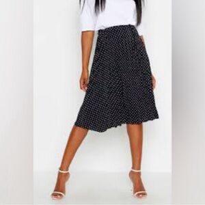 LOFT Pleated polka dot midi skirt.
Size 2 Elegant Black Polka Dot Skirt